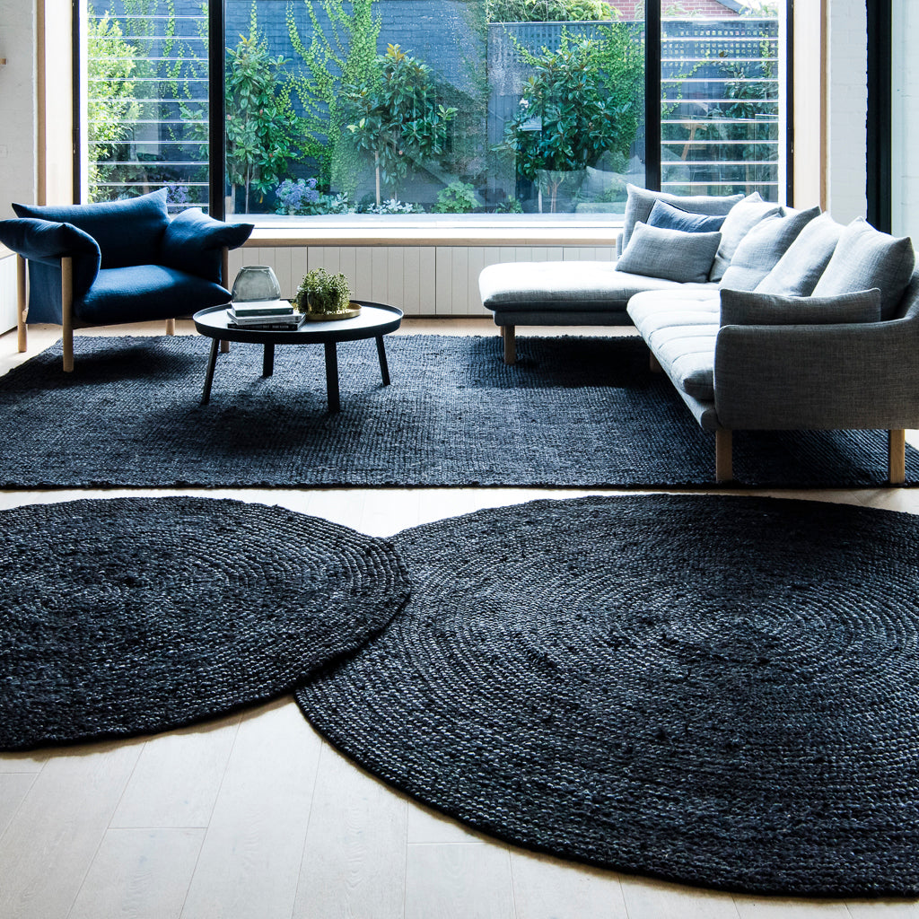 GRAPHITE RUG AND BLACK BRAIDED ROUND RUGS IN TWO SIZES